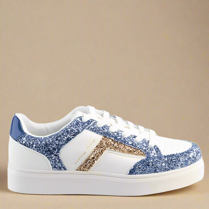 Side view of the Glitter Outline Sneaker in blue and white, showcasing its round toe and lace-up design.