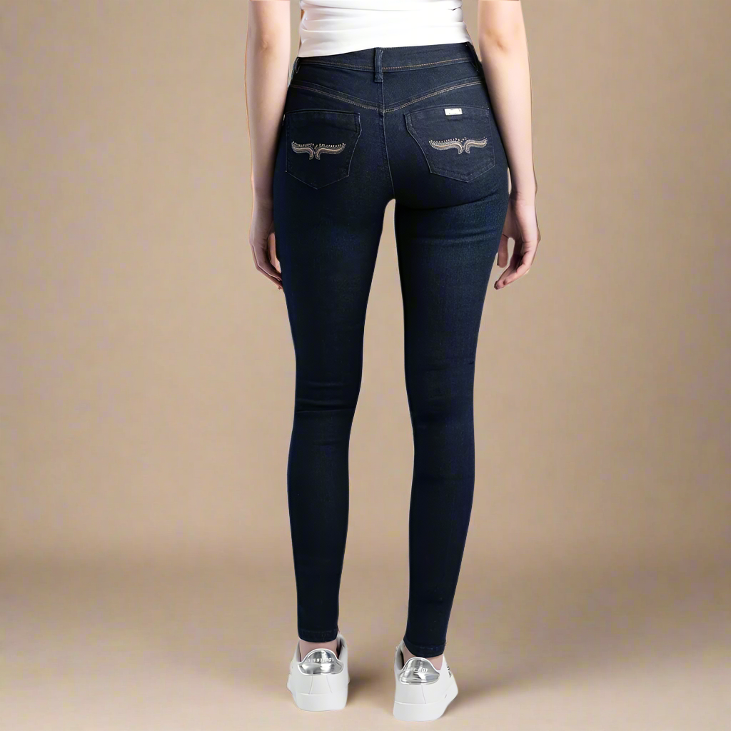 Sissy Boy Mila Rose Jeans: Dark vintage blue mid-rise skinny jeans featuring a slim fit and embroidered back pockets for a stylish look.