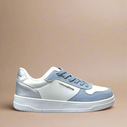 Sissy Boy Demi sneaker featuring a stylish denim upper with silver accents and contrasting white laces on a clean white base