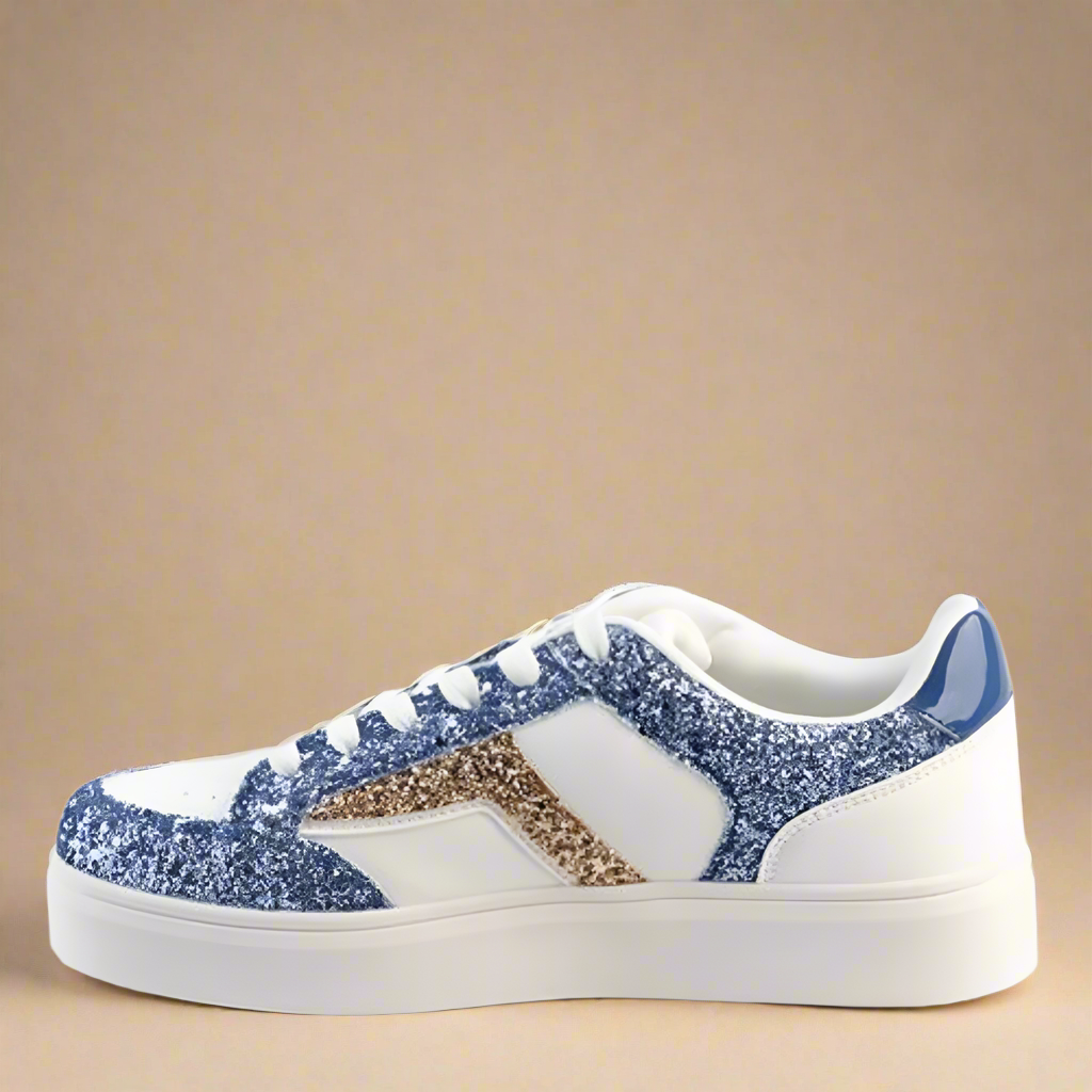 Fashionable white Sissy Boy Sneaker outlined with blue glitter