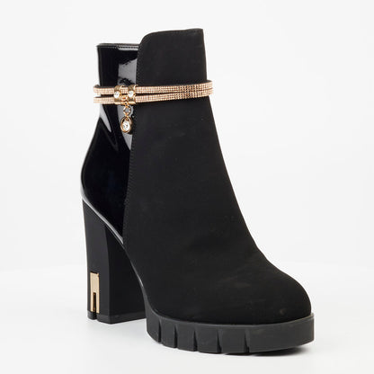 Chic Ankle Boots for Women: Elevate your wardrobe with these chic black ankle boots, designed with a modern round toe and trendy buckle details.