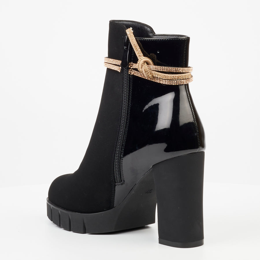 Trendy Double Buckle Design: Stand out with the decorative double buckle design on these ankle boots, adding a unique touch to your footwear collection.