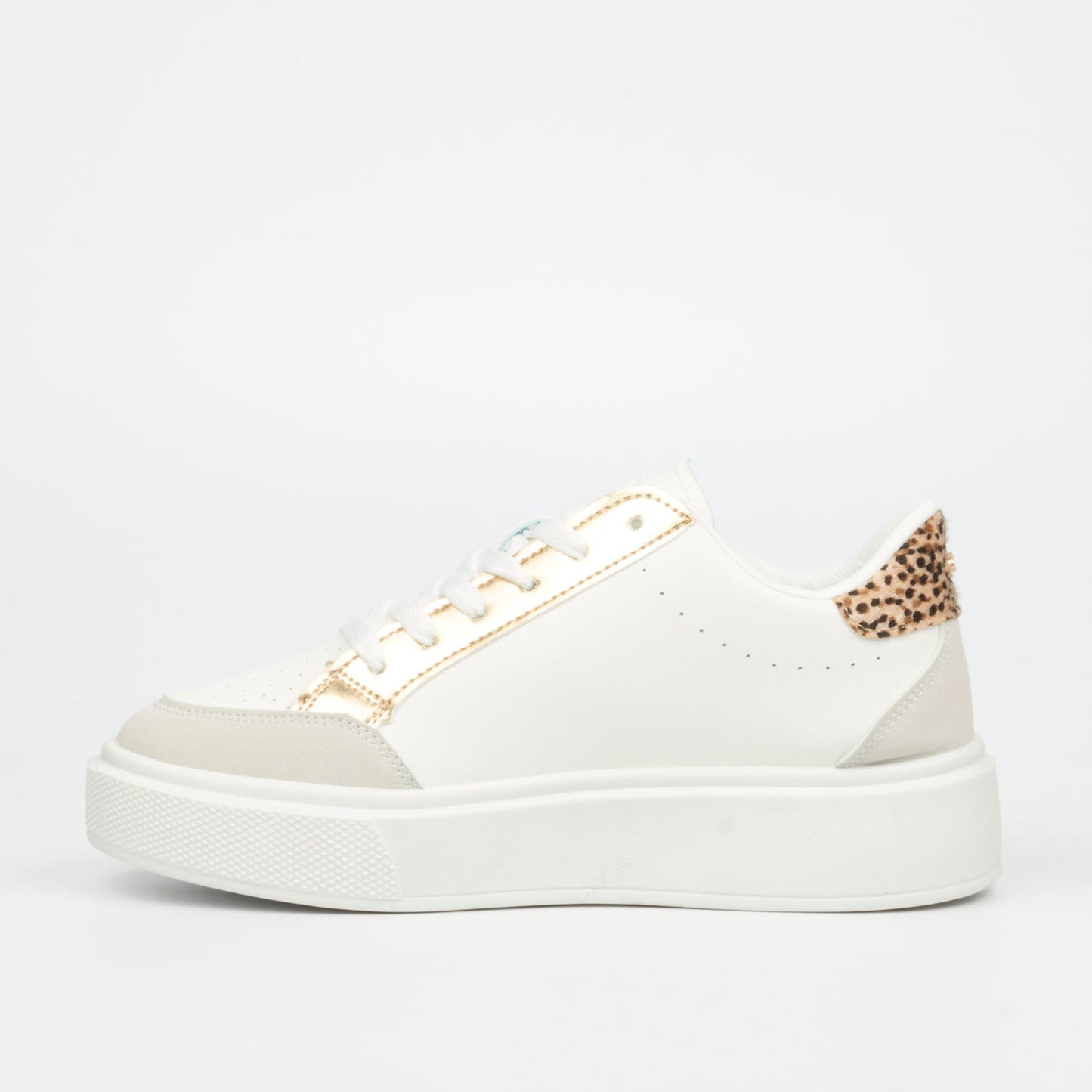 Trendy women's white sneaker with metallic detailing and fashion-forward chunky sole.